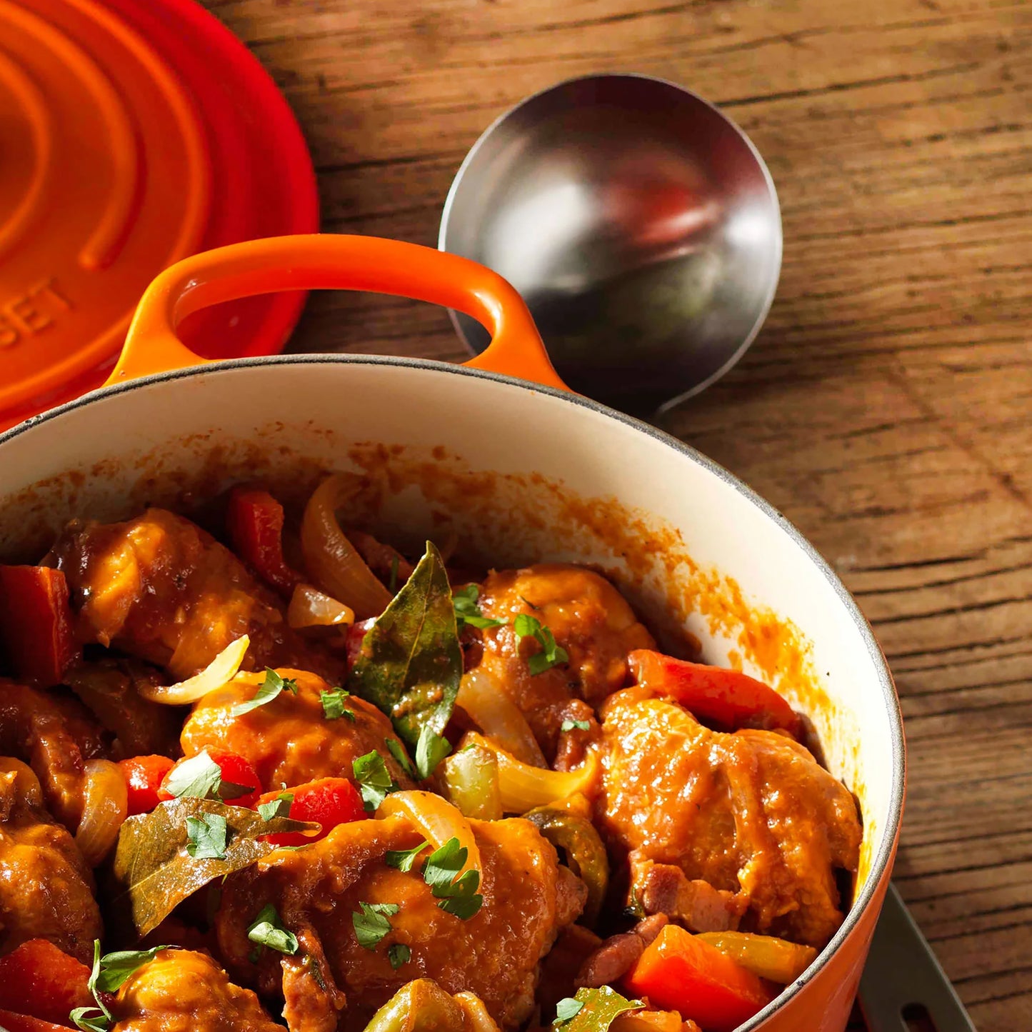 Signature Cast Iron 6.75-quart Flame Round Wide Dutch Oven with Copper Knob