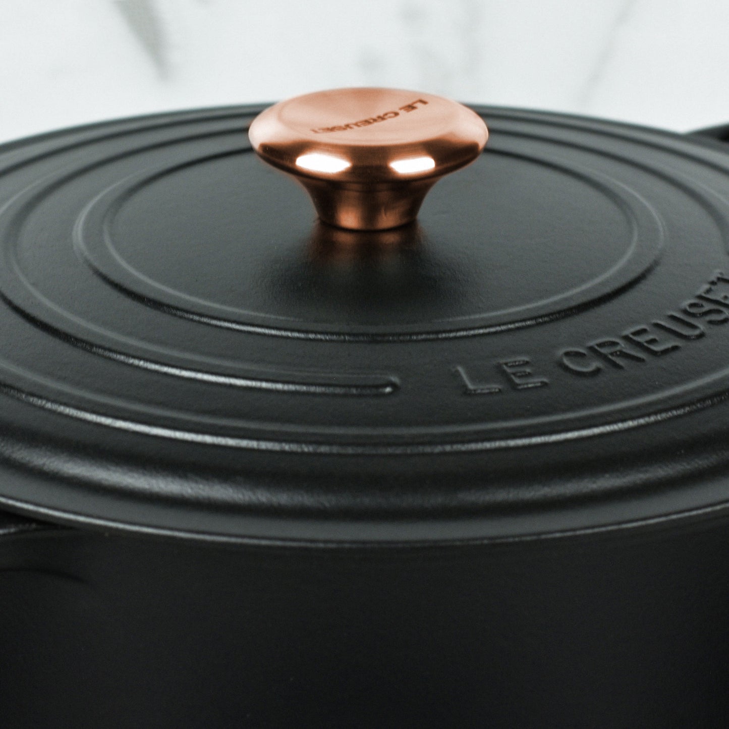 Signature Cast Iron 8-quart Licorice Oval Dutch Oven with Copper Knob