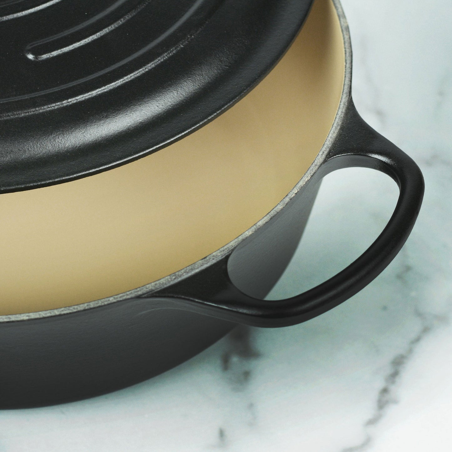 Signature Cast Iron 8-quart Licorice Oval Dutch Oven with Copper Knob