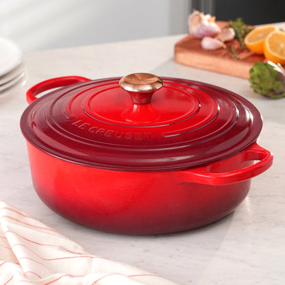 Signature Cast Iron 6.75-quart Cerise Round Wide Dutch Oven with Copper Knob