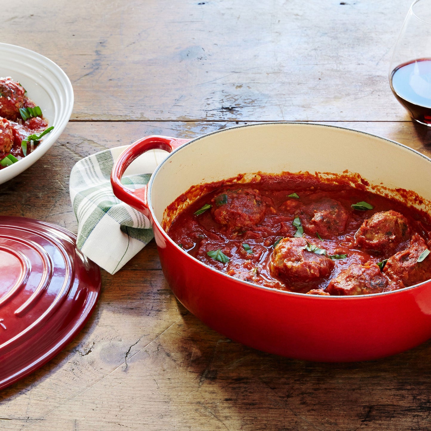 Signature Cast Iron 8-quart Cerise Oval Dutch Oven with Copper Knob
